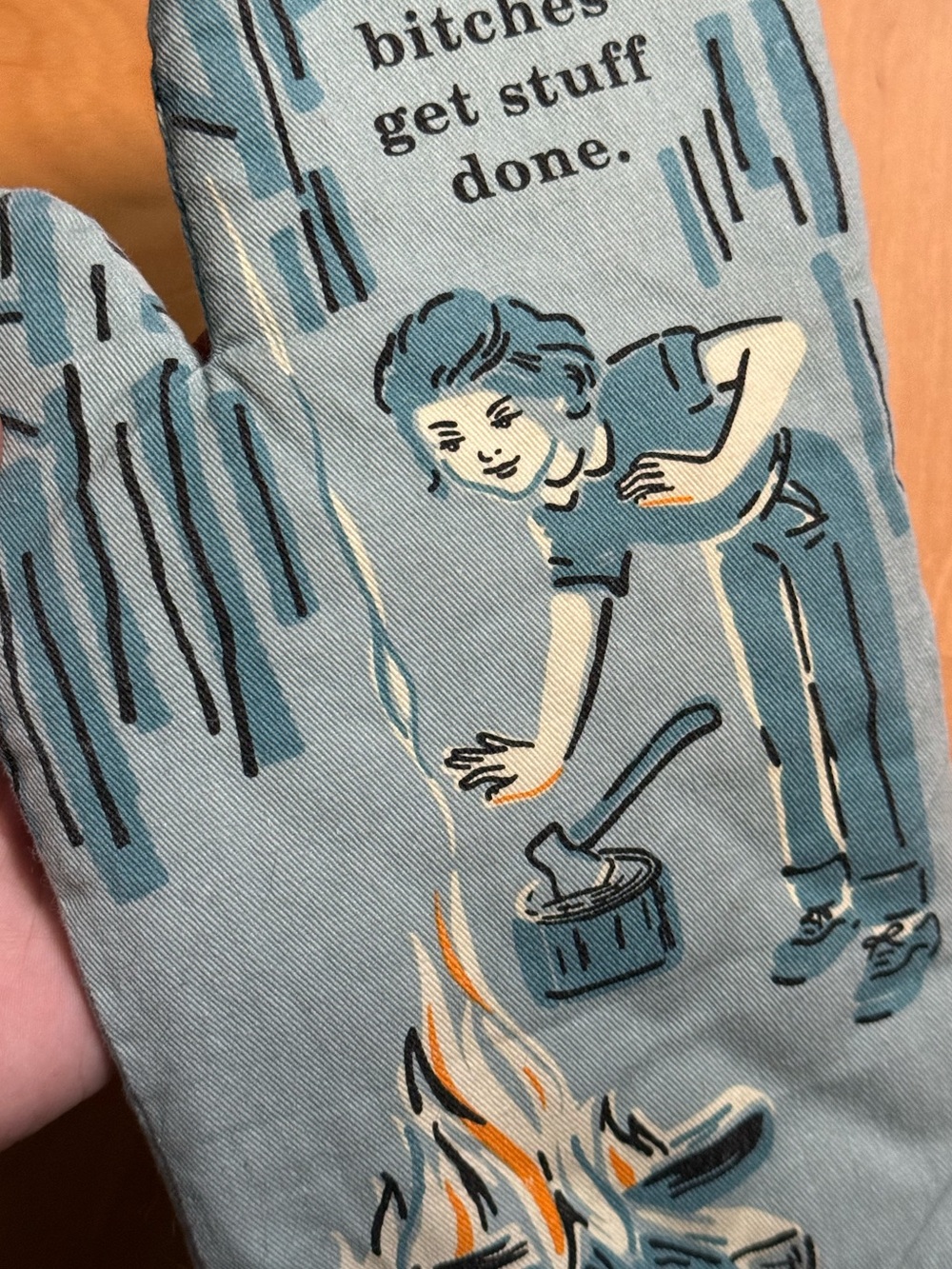 Modern Novelty Retro Style Naughty Get Stuff Done Blue Oven Mitt by Blue Q